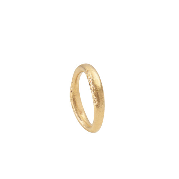 Love Ring No 3 in 18 Karat Yellow Gold textured and with the word LOVE and a heart engraved on one side.